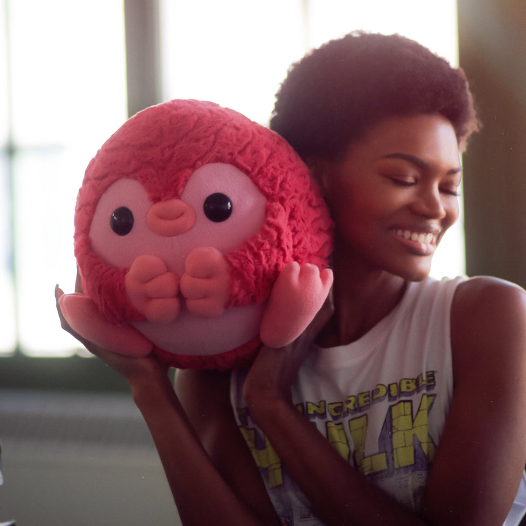 Pangolin plushie and a model