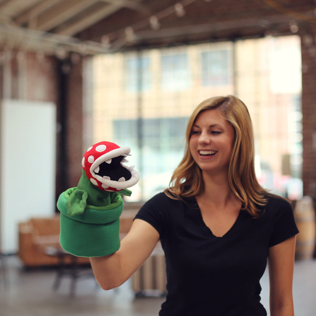 Piranha Plant puppet with a model